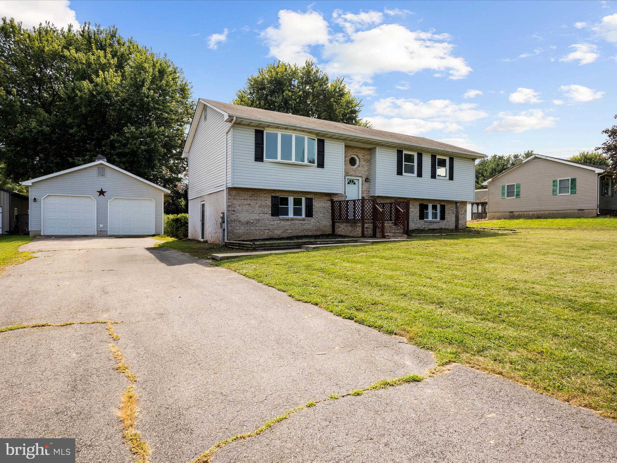 74 Ayers Drive Rising Sun, MD 21911 - Photo 36 of 41 a view of a house with a swimming pool and a yard