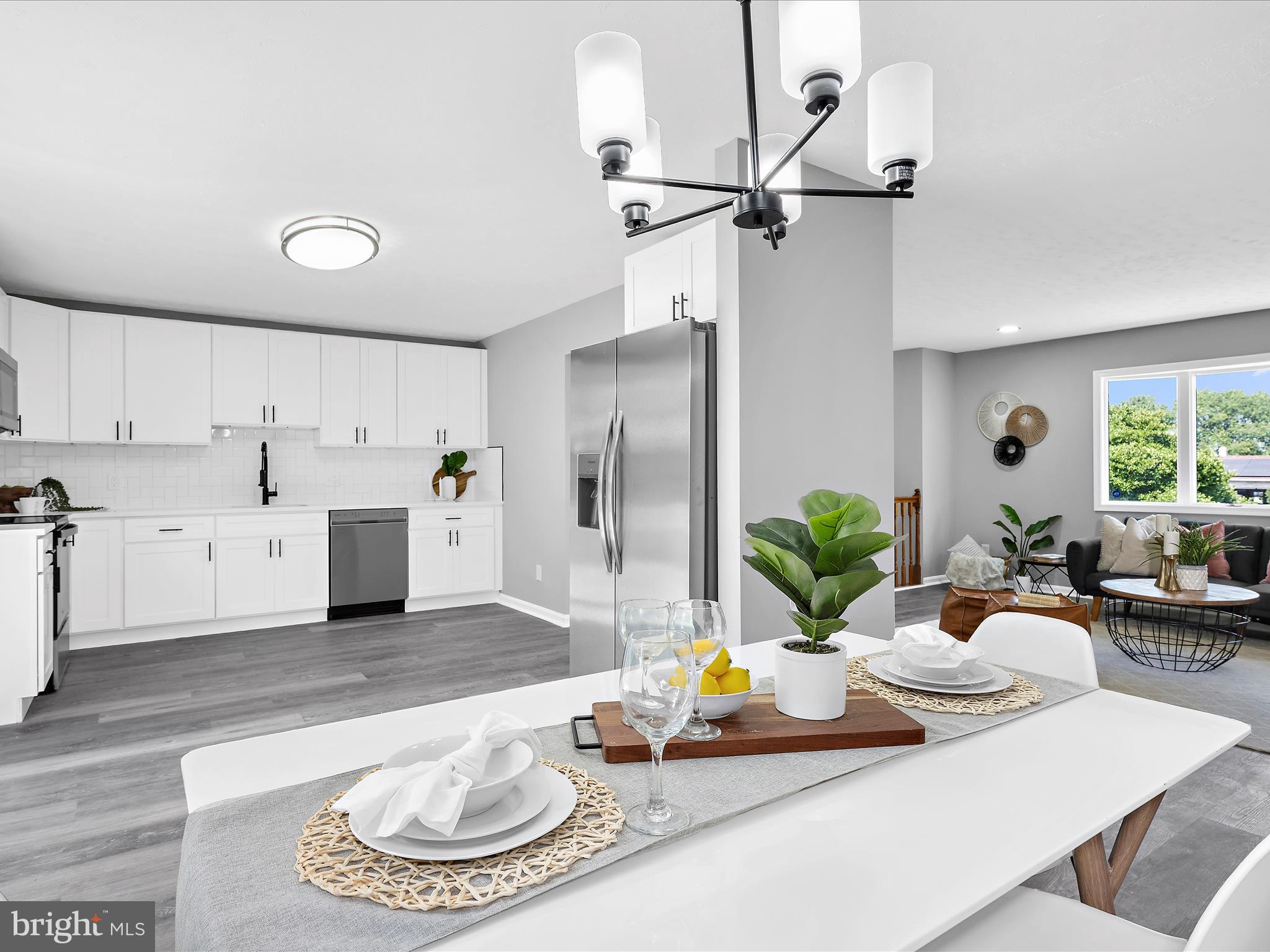 74 Ayers Drive Rising Sun, MD 21911 - Photo 8 of 41 a living room with furniture and a kitchen view