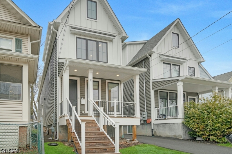 71 Mission Street, Unit 2 Montclair, NJ 07042 - Photo 1 of 25 front view of a house with a small yard