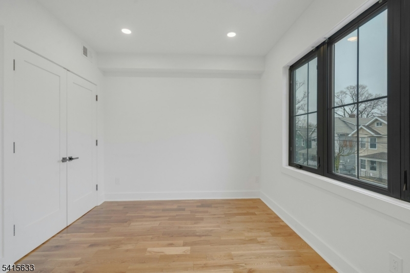 71 Mission Street, Unit 2 Montclair, NJ 07042 - Photo 11 of 25 a view of an empty room with a window
