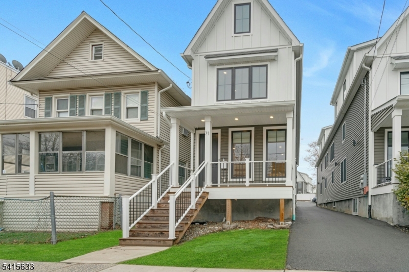 71 Mission Street, Unit 2 Montclair, NJ 07042 - Photo 24 of 25 a front view of a house with a yard