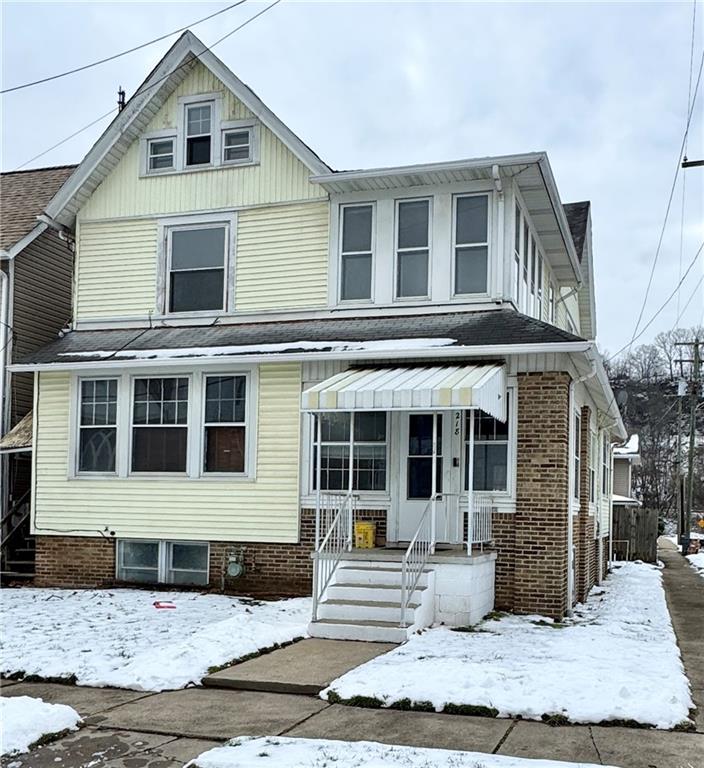 218 Clifford Avenue Apollo, PA 15613 - Photo 2 of 32 a front view of a house with a patio