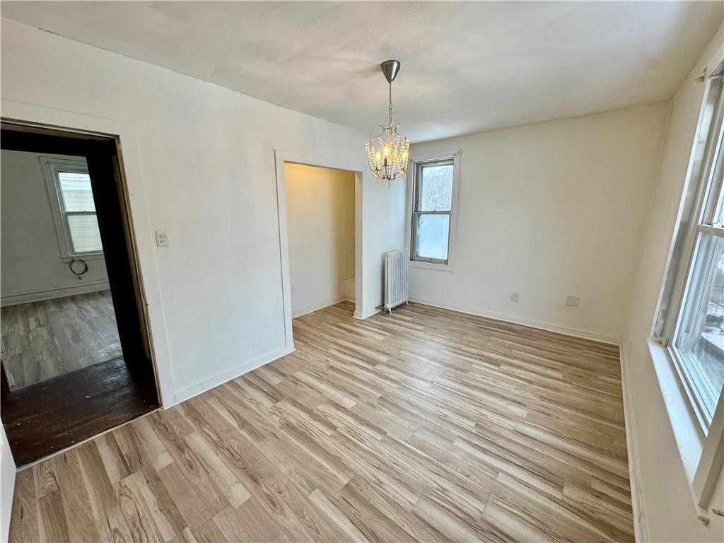 218 Clifford Avenue Apollo, PA 15613 - Photo 23 of 32 a view of empty room with window and wooden floor