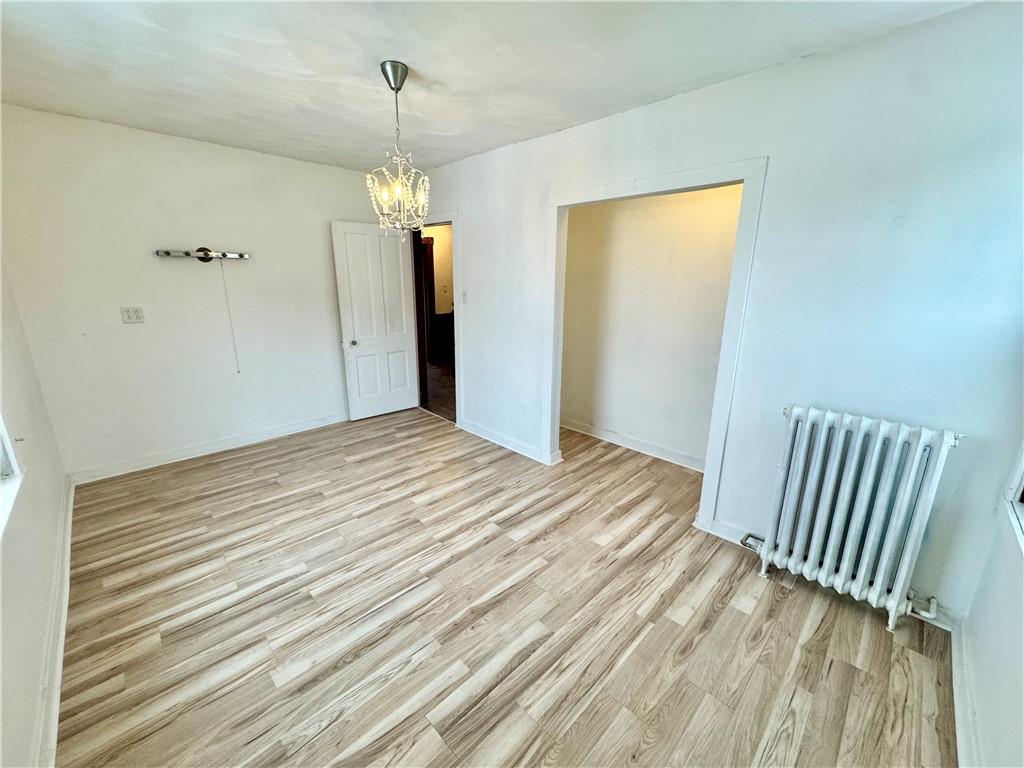 218 Clifford Avenue Apollo, PA 15613 - Photo 25 of 32 a view of a room with wooden floor and staircase