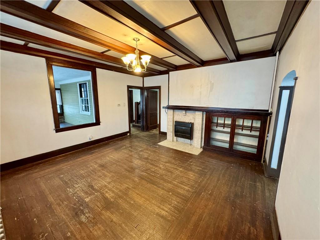 218 Clifford Avenue Apollo, PA 15613 - Photo 4 of 32 a view of an empty room with window and fireplace