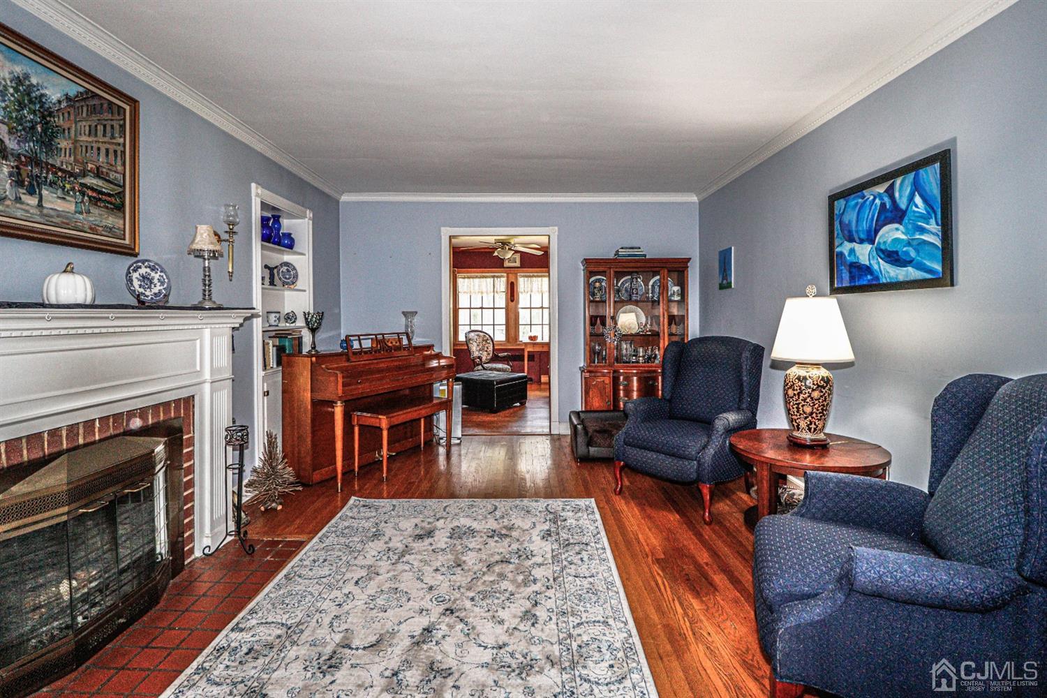 485 Whitewood Road Union, NJ 07083 - Photo 14 of 24 a living room with furniture fireplace and rug