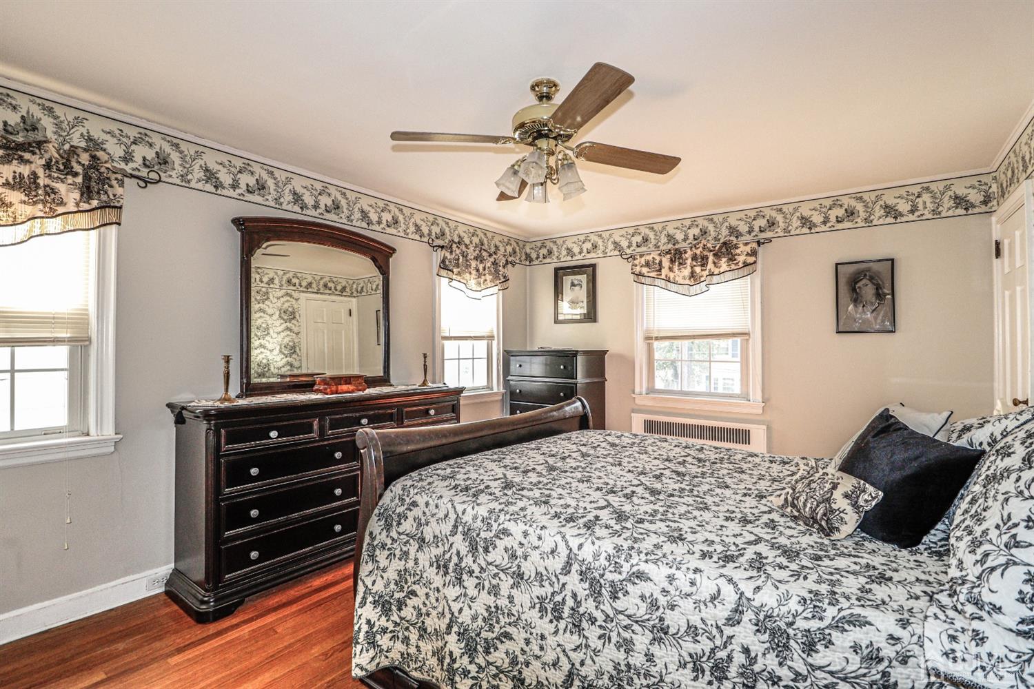 485 Whitewood Road Union, NJ 07083 - Photo 16 of 24 a bedroom with a bed and wooden floor