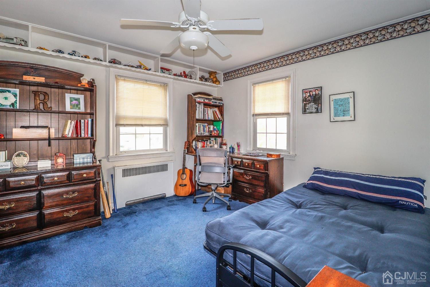 485 Whitewood Road Union, NJ 07083 - Photo 19 of 24 a bedroom with furniture and a window