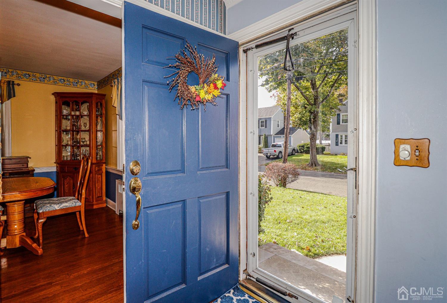 485 Whitewood Road Union, NJ 07083 - Photo 4 of 24 a view of an entryway with wooden floor and a window