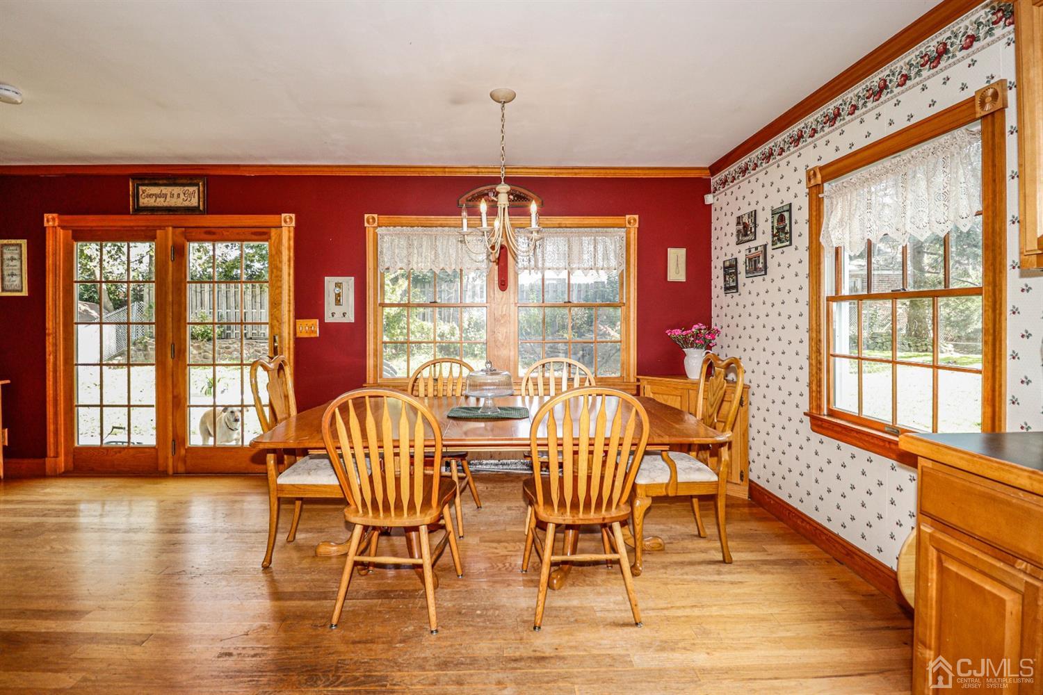 485 Whitewood Road Union, NJ 07083 - Photo 8 of 24 a dining room with furniture window wooden floor