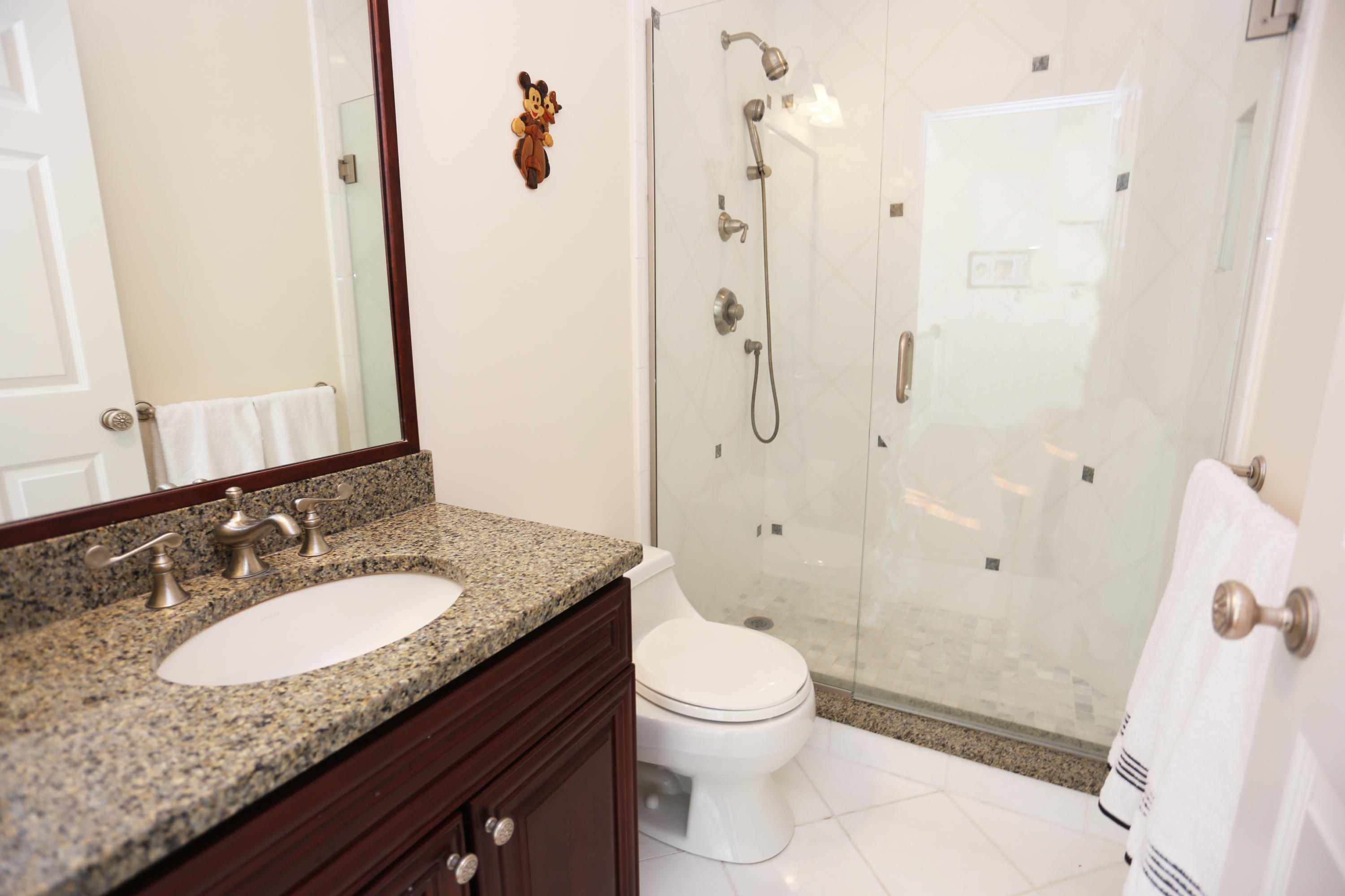 99 Phillips Road Sagamore Beach, MA 02562 - Photo 30 of 30 a bathroom with a granite countertop sink toilet and shower