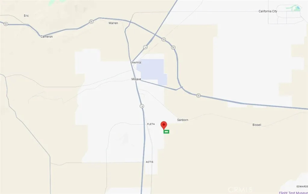 0 Dominion Street Mojave, CA 93501 - Photo 6 of 9 a white house that has a street sign on it