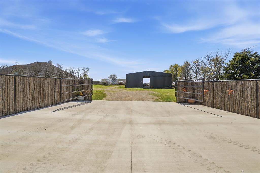 333 Meadow Crest Road Fort Worth, TX 76108 - Photo 24 of 32 barn entrance