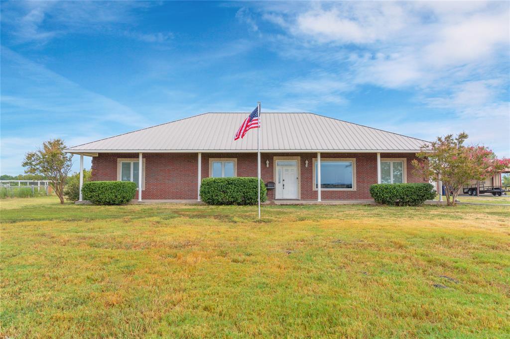 4008 Old Highway 6 Howe, TX 75459 - Photo 1 of 1 a front view of a house with a yard