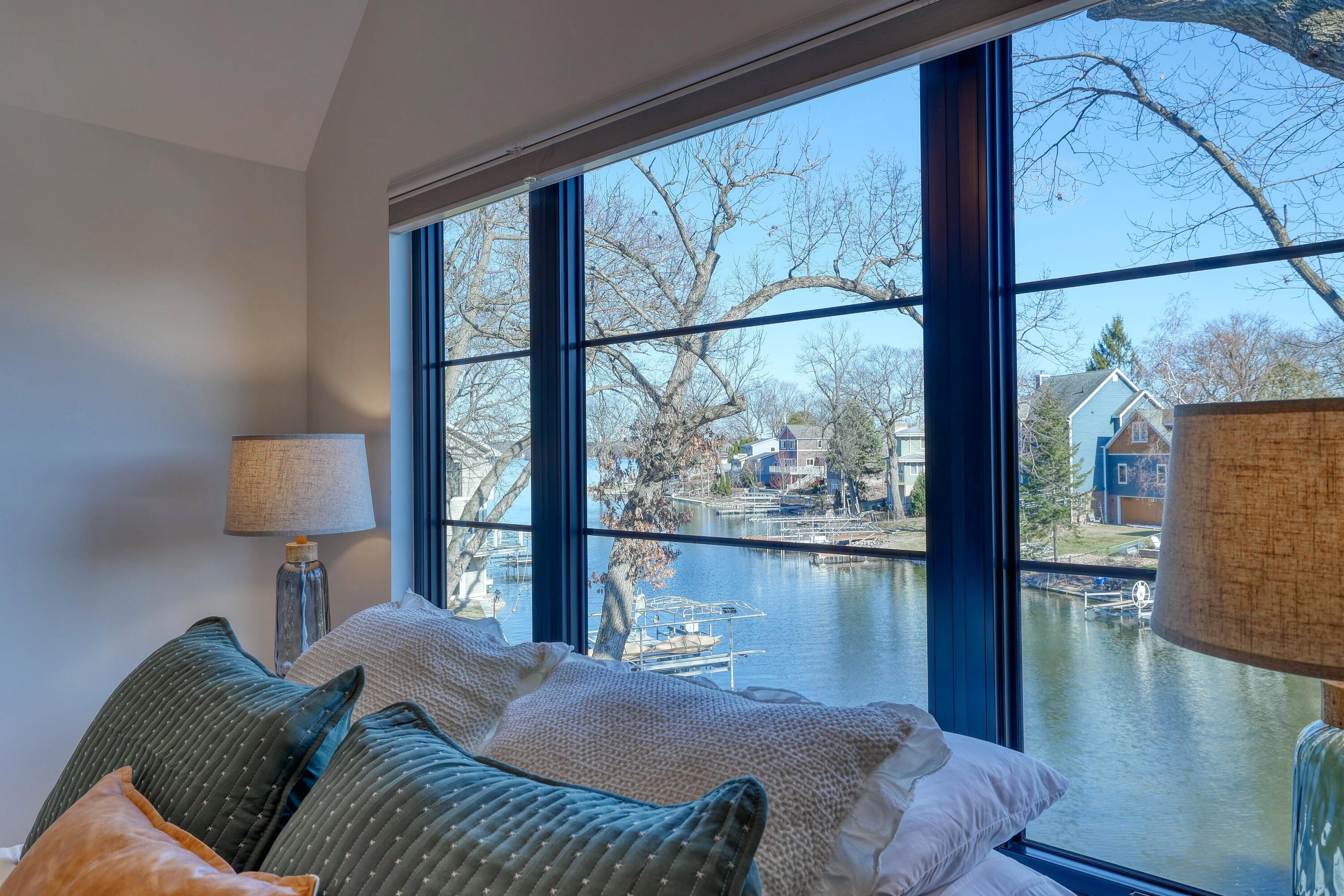 W345N5746 Rd G Oconomowoc, WI 53066 - Photo 35 of 64 Master Bedroom Lake Views!