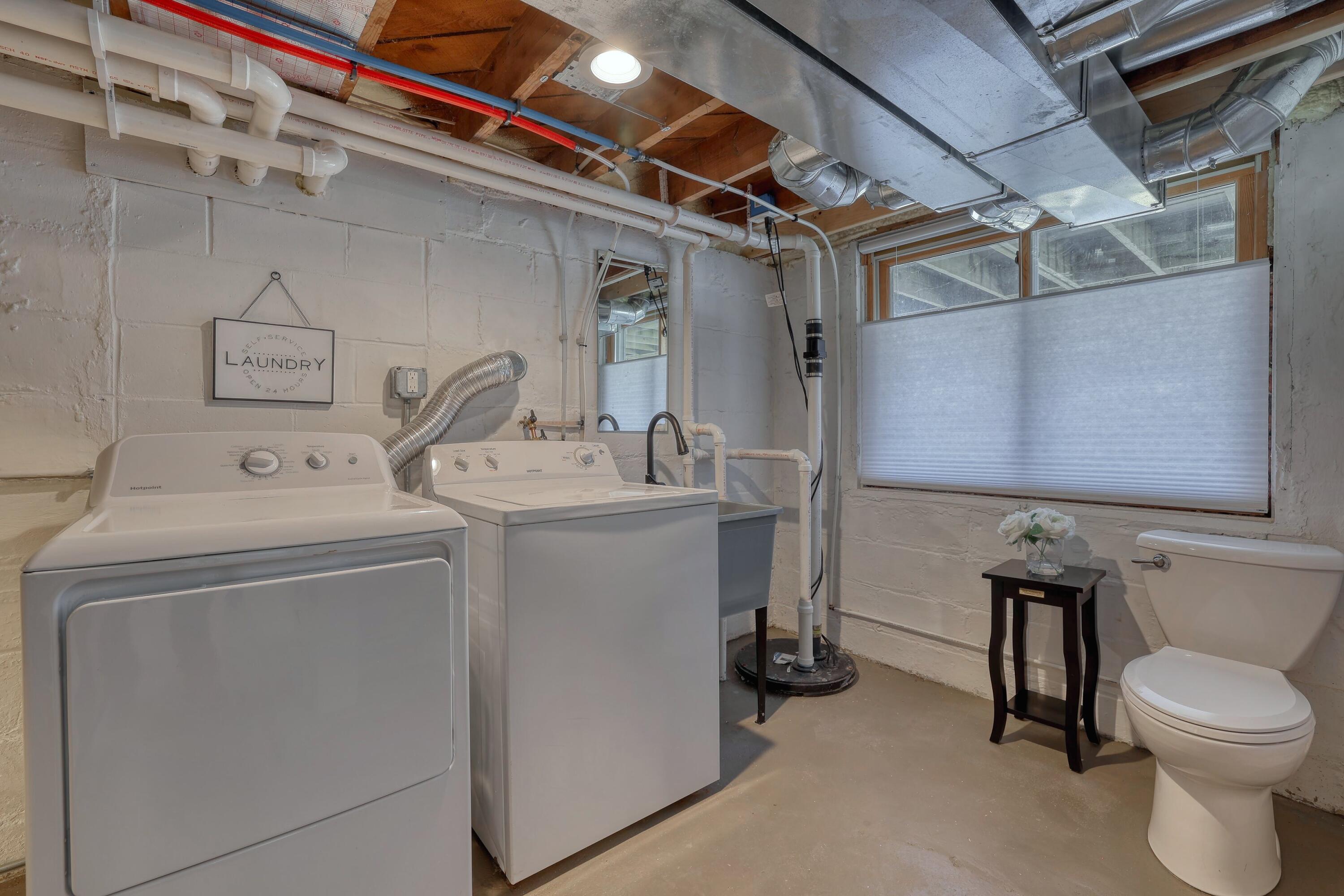 W345N5746 Rd G Oconomowoc, WI 53066 - Photo 52 of 64 Lower Level 1/2 Bath & Laundry