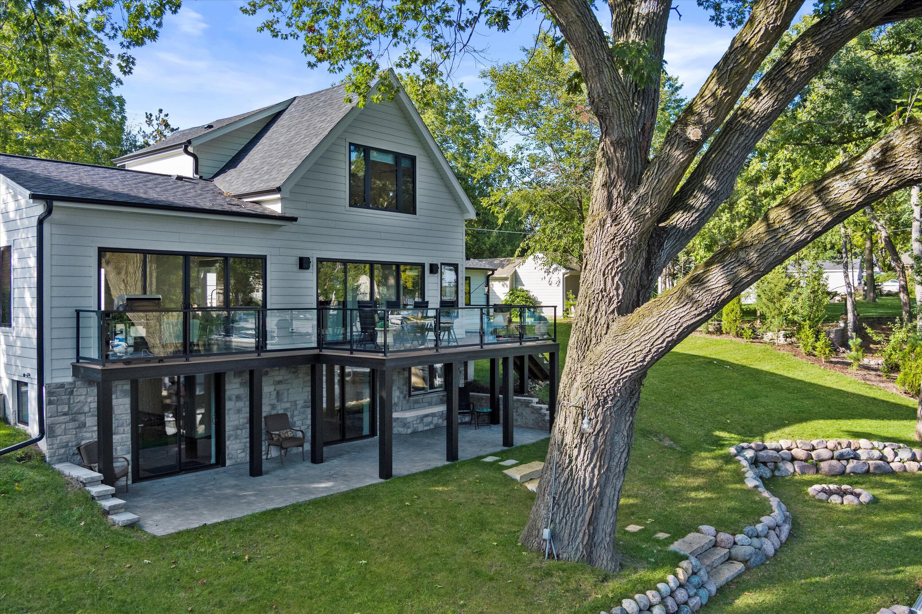 W345N5746 Rd G Oconomowoc, WI 53066 - Photo 7 of 64 Gentle slope to lake