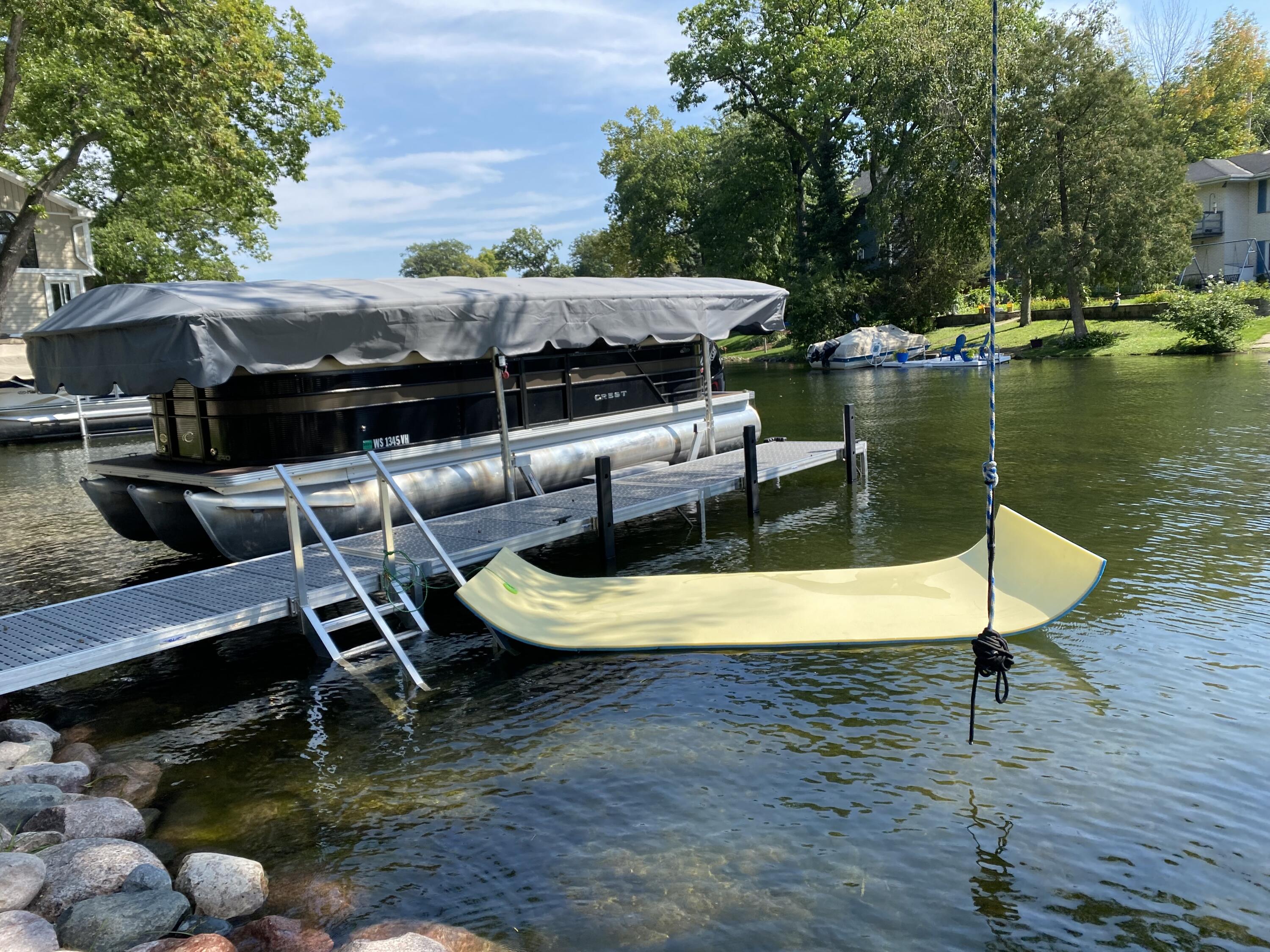 W345N5746 Rd G Oconomowoc, WI 53066 - Photo 9 of 64 Rope swing & swim stairs