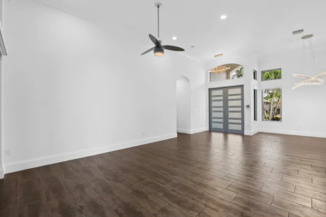 a view of a kitchen with a sink and a window