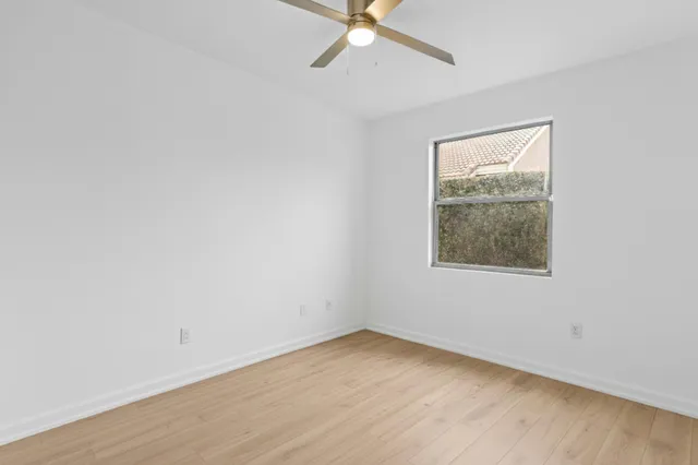 a view of a swimming pool with a lounge chairs