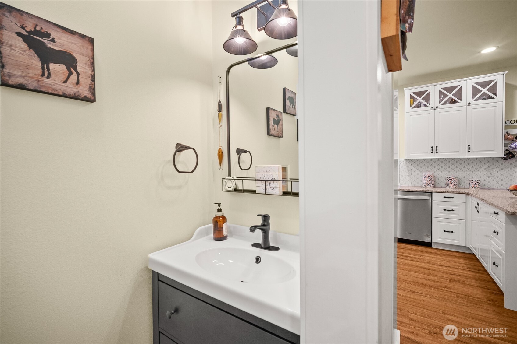 23 Spring Court Bellingham, WA 98229 - Photo 16 of 38 a bathroom with a sink and a mirror
