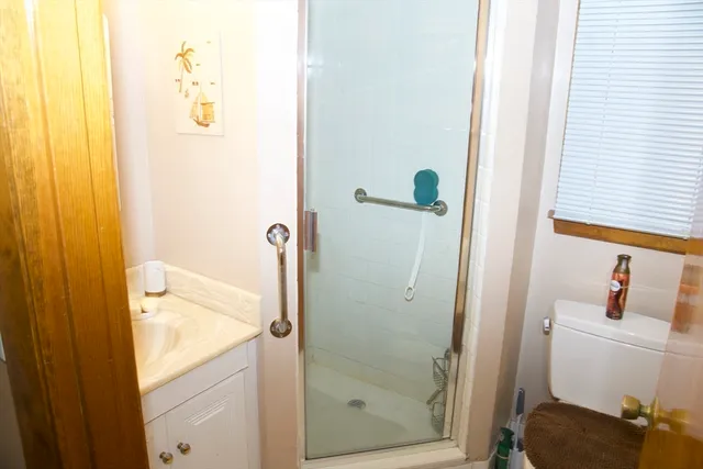 a view of a chairs and tables in a room