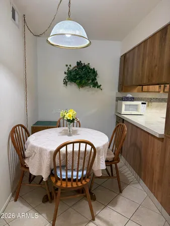 a view of a dining room with furniture