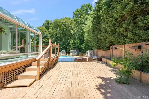 a house with a yard and a large tree