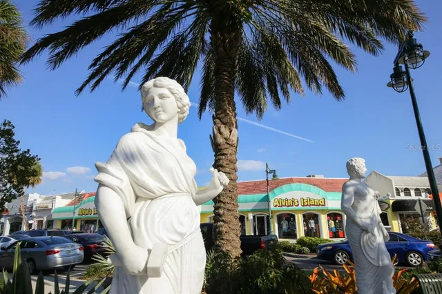 a front view of a building with outdoor space