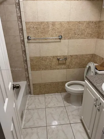 a bathroom with a toilet