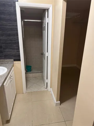 a bathroom with a sink and a tub