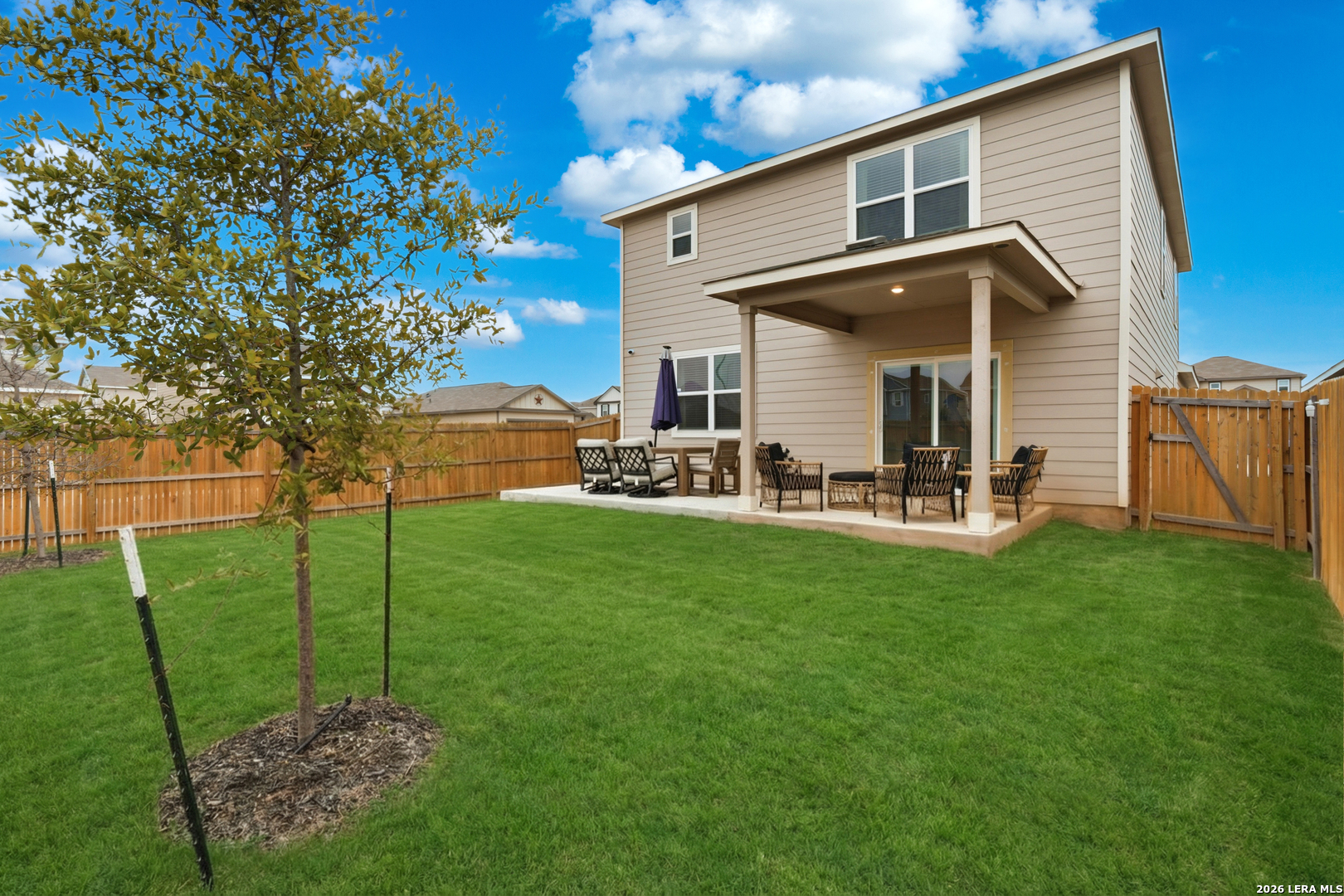 3523 Rancho Grande San Antonio, TX 78224 - Photo 20 of 22 a front view of a house with garden