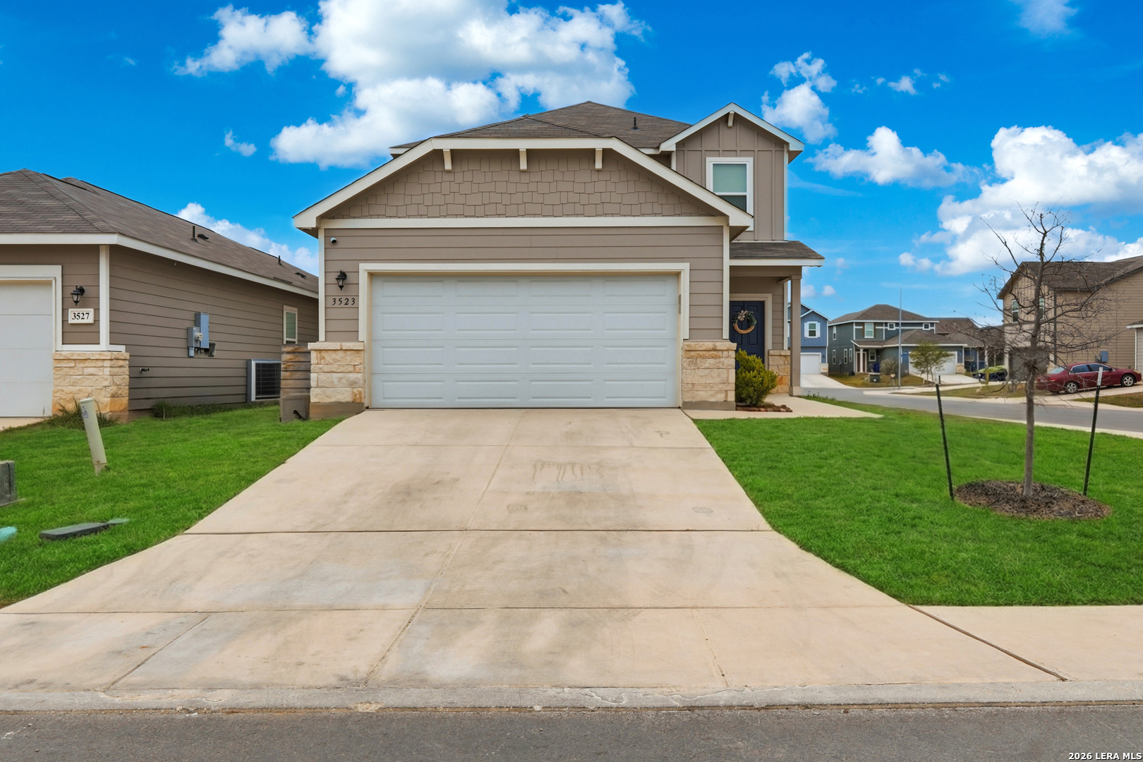3523 Rancho Grande San Antonio, TX 78224 - Photo 2 of 22 a front view of a house with a yard and garage