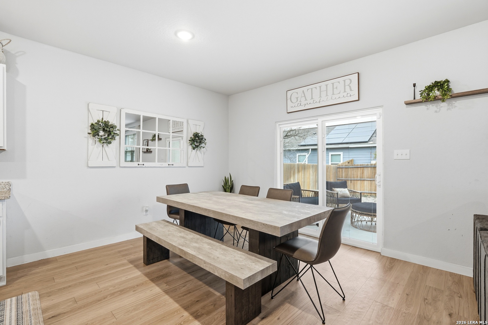 3523 Rancho Grande San Antonio, TX 78224 - Photo 9 of 22 a view of a dining room with furniture window and wooden floor