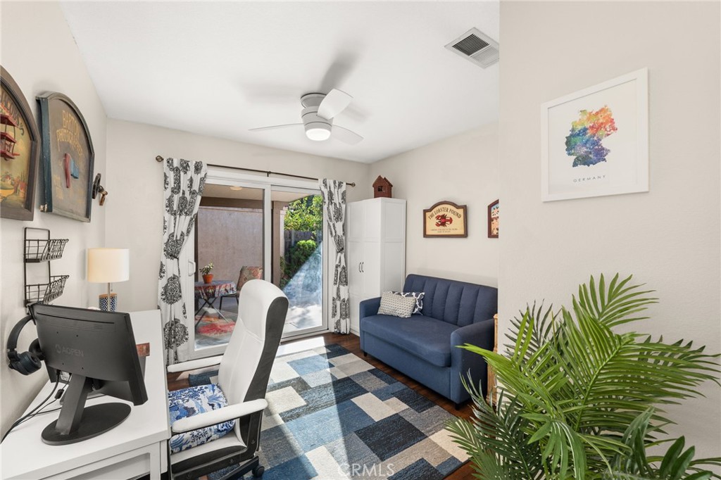 8576 Creekside Place Rancho Cucamonga, CA 91730 - Photo 16 of 37 a living room with furniture and a potted plant