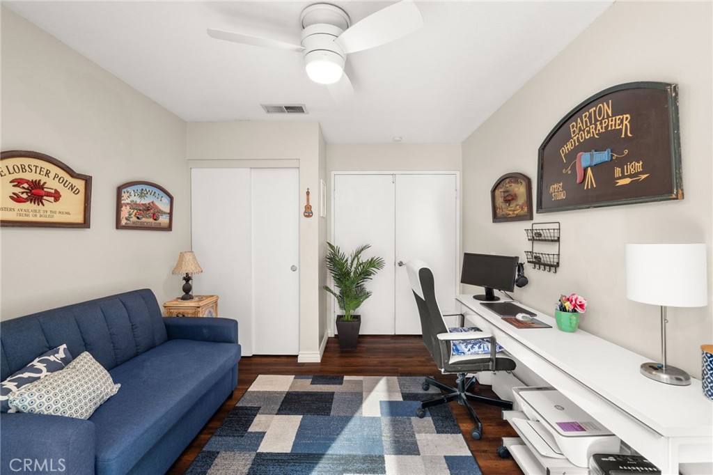8576 Creekside Place Rancho Cucamonga, CA 91730 - Photo 17 of 37 a living room with furniture and wooden floor