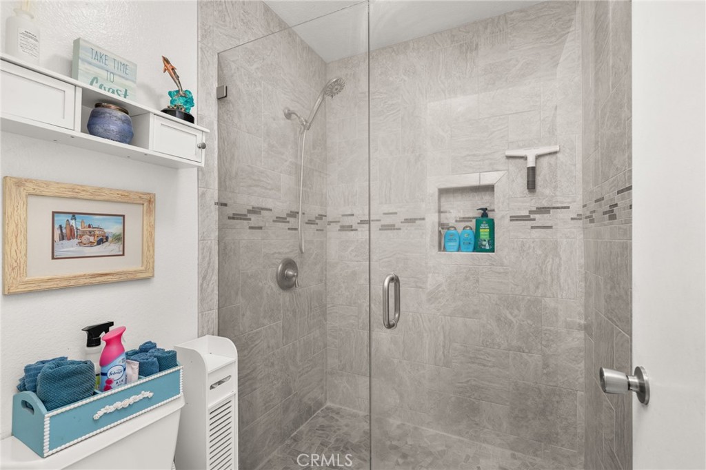 8576 Creekside Place Rancho Cucamonga, CA 91730 - Photo 21 of 37 a bathroom with a shower