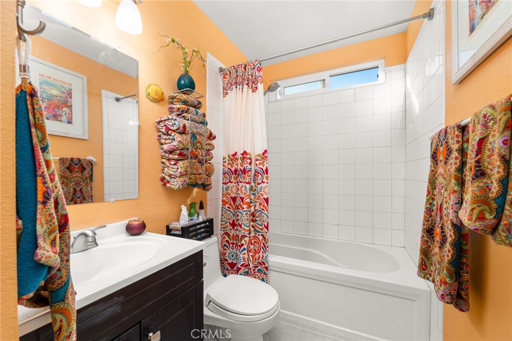 8576 Creekside Place Rancho Cucamonga, CA 91730 - Photo 25 of 37 a bathroom with a sink toilet and shower