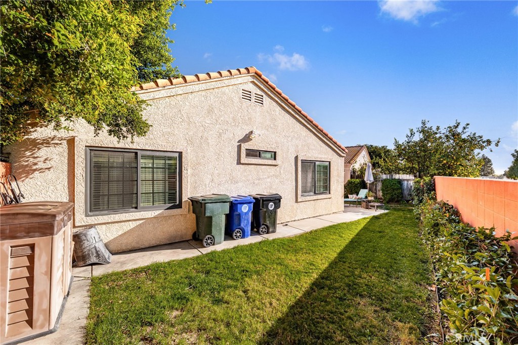 8576 Creekside Place Rancho Cucamonga, CA 91730 - Photo 30 of 37 a view of house with backyard and sitting area