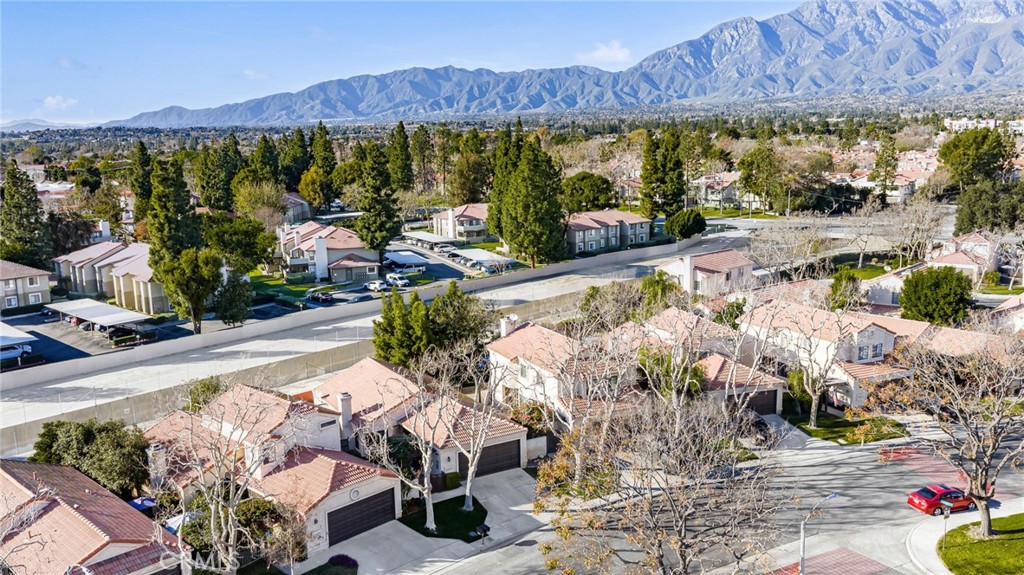 8576 Creekside Place Rancho Cucamonga, CA 91730 - Photo 31 of 37 a view of a swimming pool with a patio