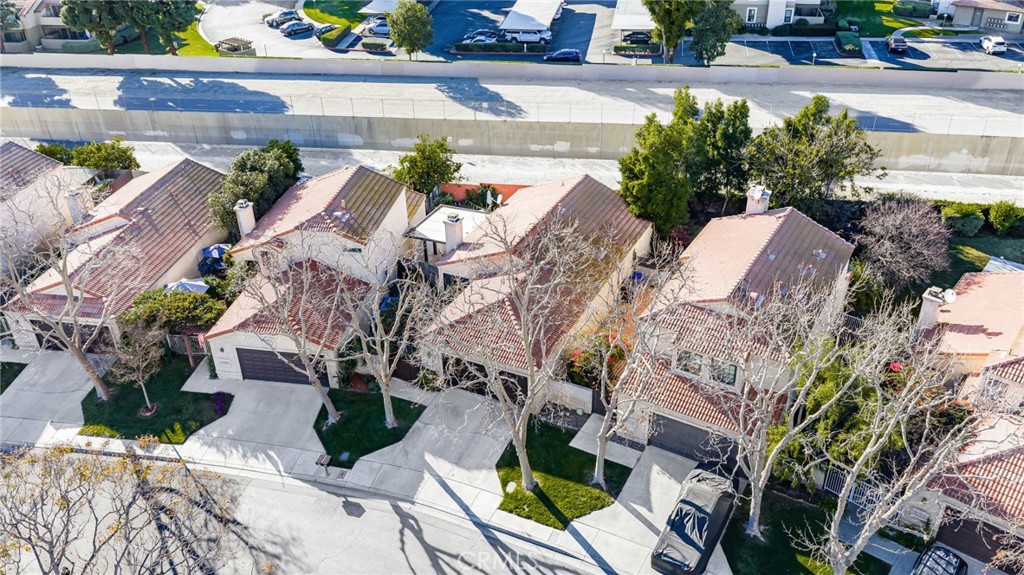 8576 Creekside Place Rancho Cucamonga, CA 91730 - Photo 32 of 37 an aerial view of a house with garden space and street view