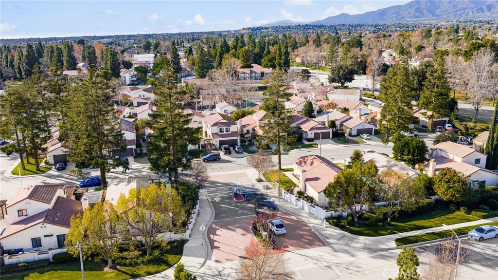 8576 Creekside Place Rancho Cucamonga, CA 91730 - Photo 36 of 37 an aerial view of a city with swimming pool