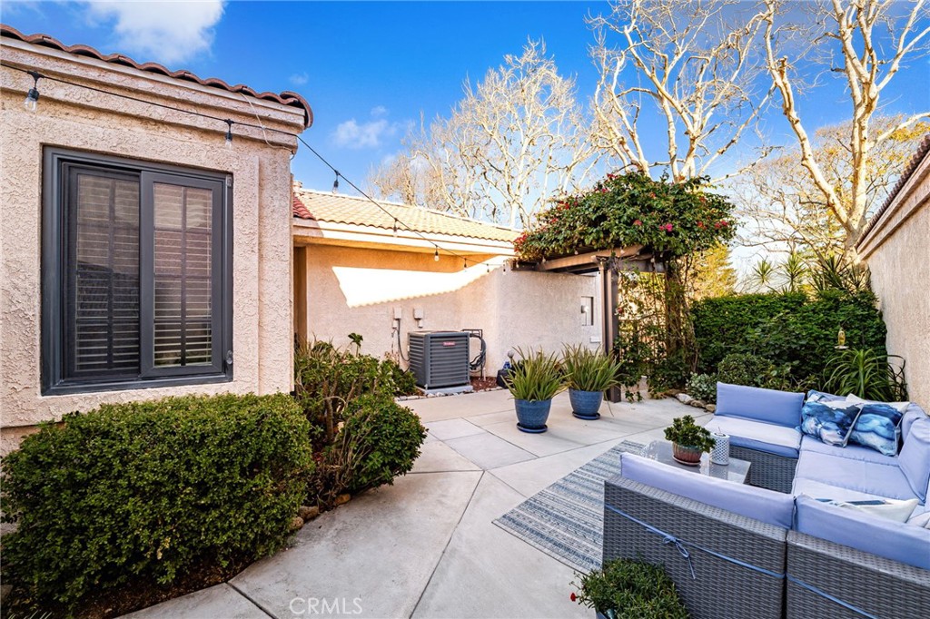 8576 Creekside Place Rancho Cucamonga, CA 91730 - Photo 7 of 37 a view of a patio with couches and potted plants