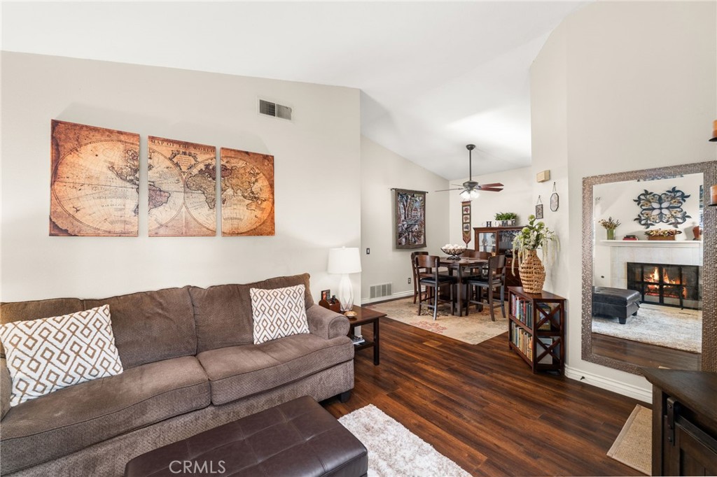 8576 Creekside Place Rancho Cucamonga, CA 91730 - Photo 9 of 37 a living room with furniture and wooden floor