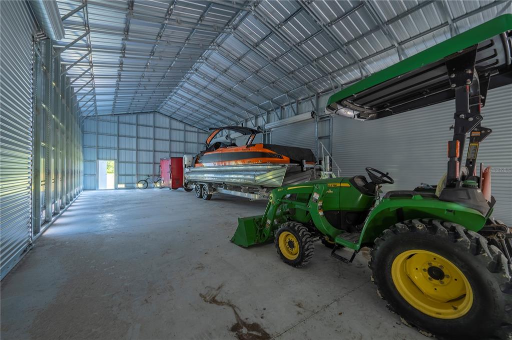 2593 Gene's Little Road Arcadia, FL 34266 - Photo 14 of 34 a view of car parked in garage