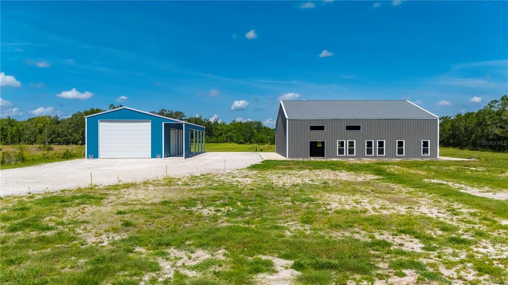 2593 Gene's Little Road Arcadia, FL 34266 - Photo 17 of 34 a front view of a house with garden