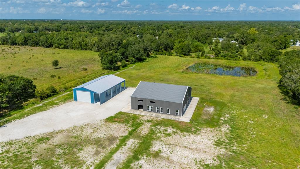 2593 Gene's Little Road Arcadia, FL 34266 - Photo 32 of 34 a view of a house with a yard