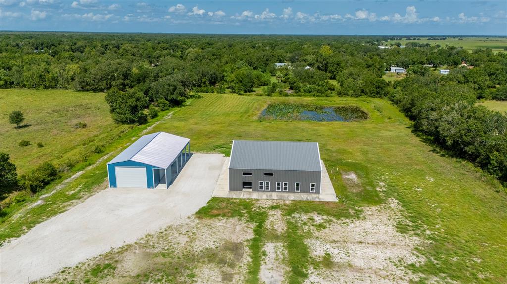 2593 Gene's Little Road Arcadia, FL 34266 - Photo 33 of 34 a view of a house with a yard