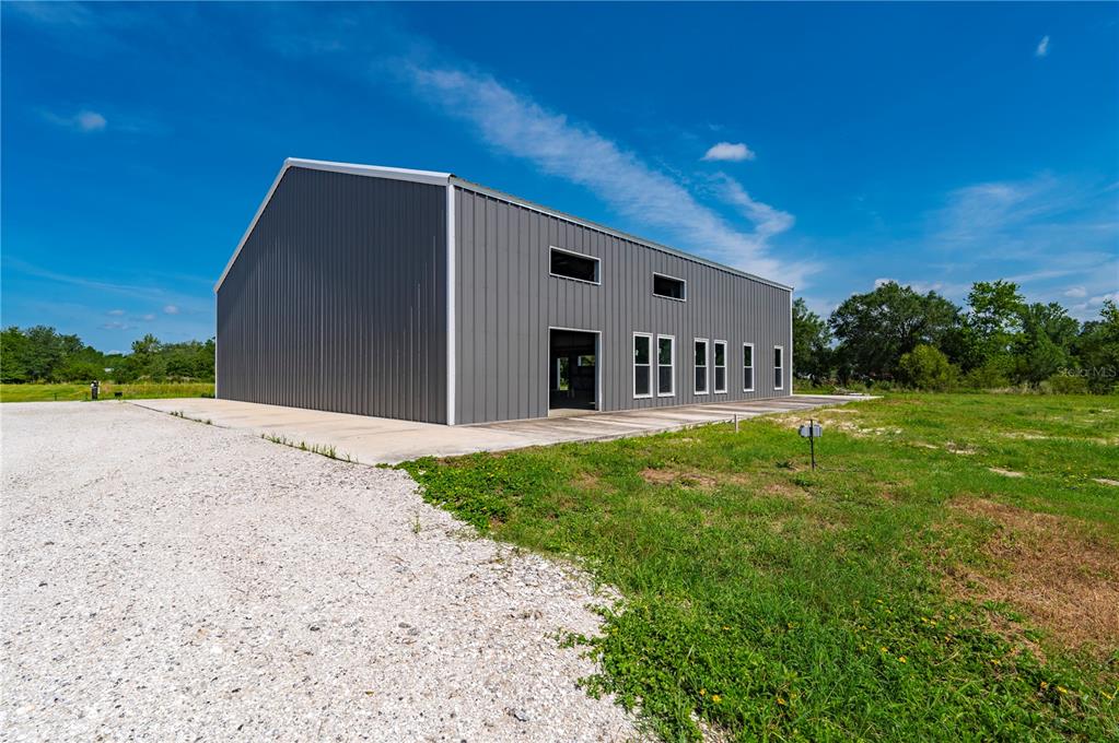 2593 Gene's Little Road Arcadia, FL 34266 - Photo 4 of 34 a backyard of a house with a yard and outdoor seating