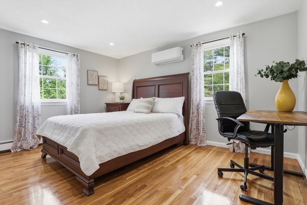 33 Simon Willard Road Acton, MA 01720 - Photo 24 of 42 a bedroom with a bed chair and window